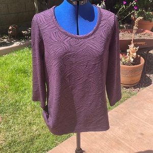 Chico’s purple shirt